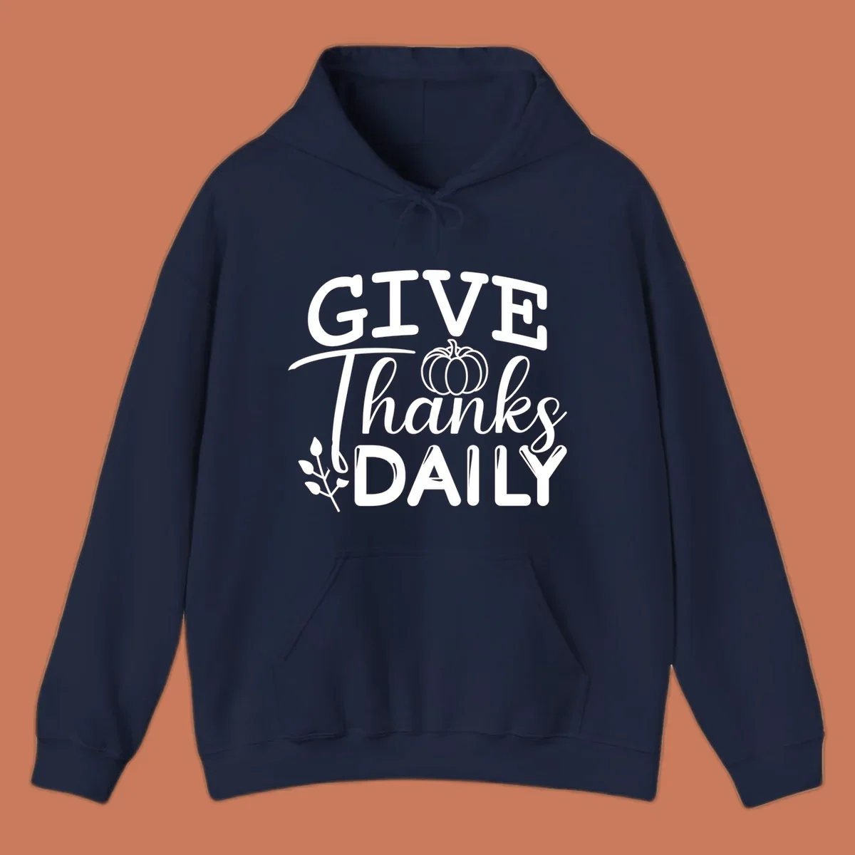 Give Thanks Daily text with a pumpkin and leaf sprig.