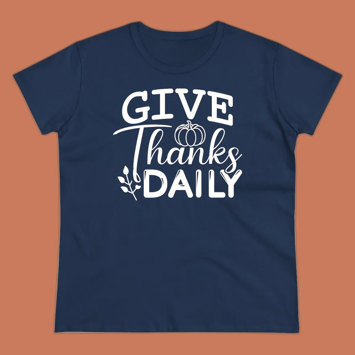Give Thanks Daily text with a pumpkin and leaf sprig.