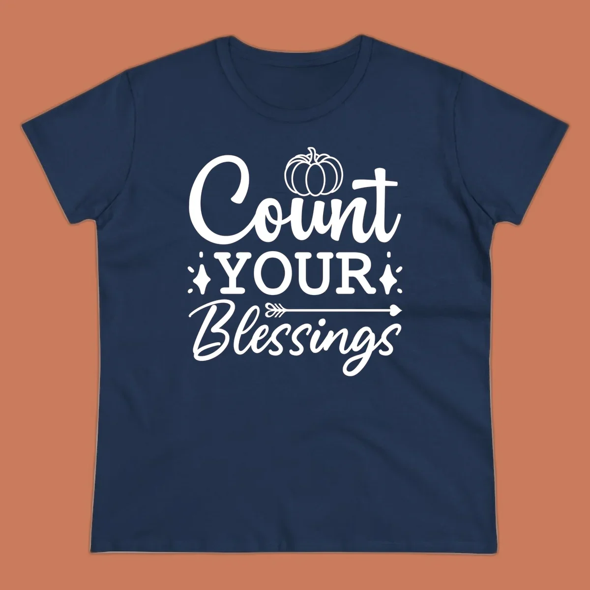 Count your blessings text with pumpkin and arrow graphic, in white.