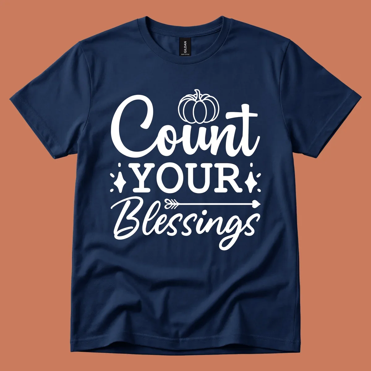Count your blessings text with pumpkin and arrow graphic, in white.