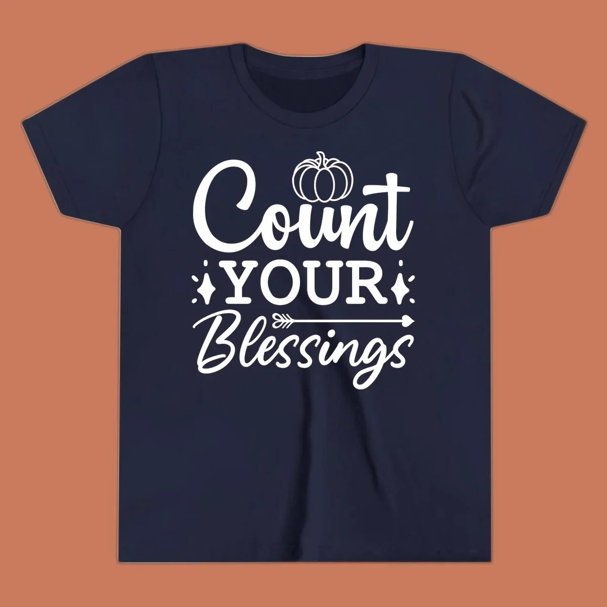 Count your blessings text with pumpkin and arrow graphic, in white.