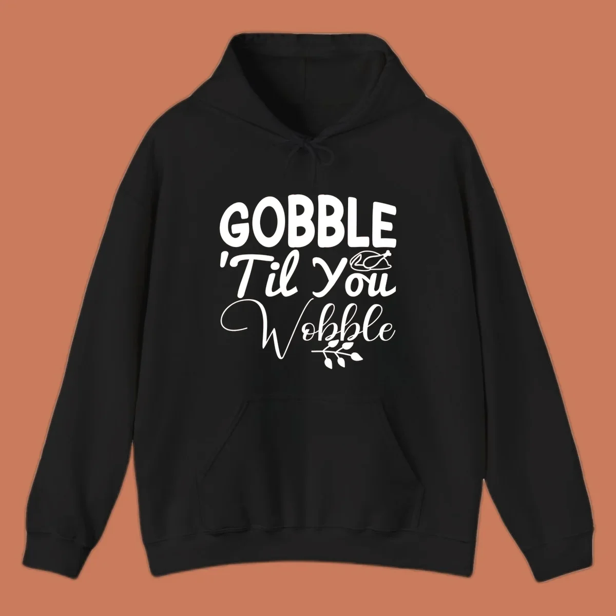 Gobble wobble thanksgiving phrase with roasted turkey illustration and leafy branch.