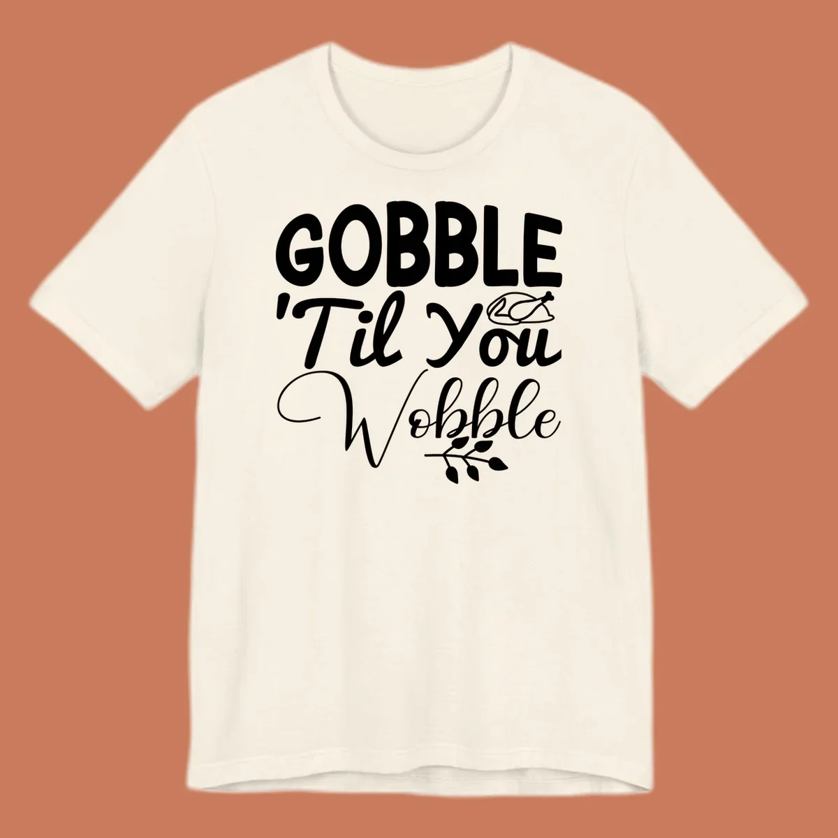 Gobble wobble thanksgiving phrase with roasted turkey illustration and leafy branch.