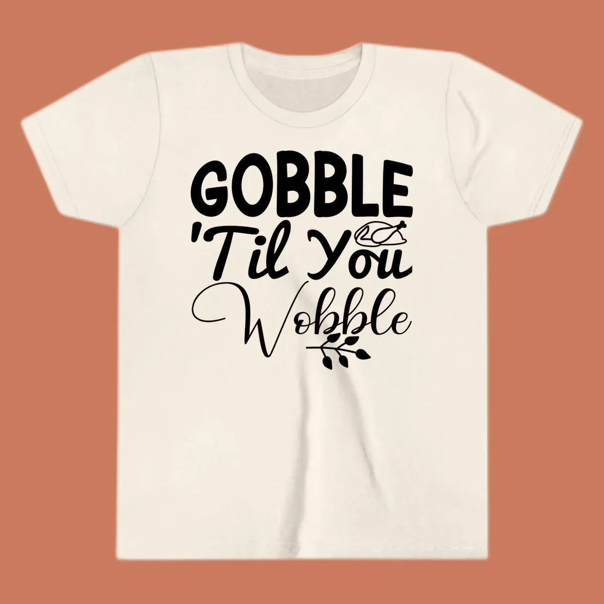 Gobble wobble thanksgiving phrase with roasted turkey illustration and leafy branch.