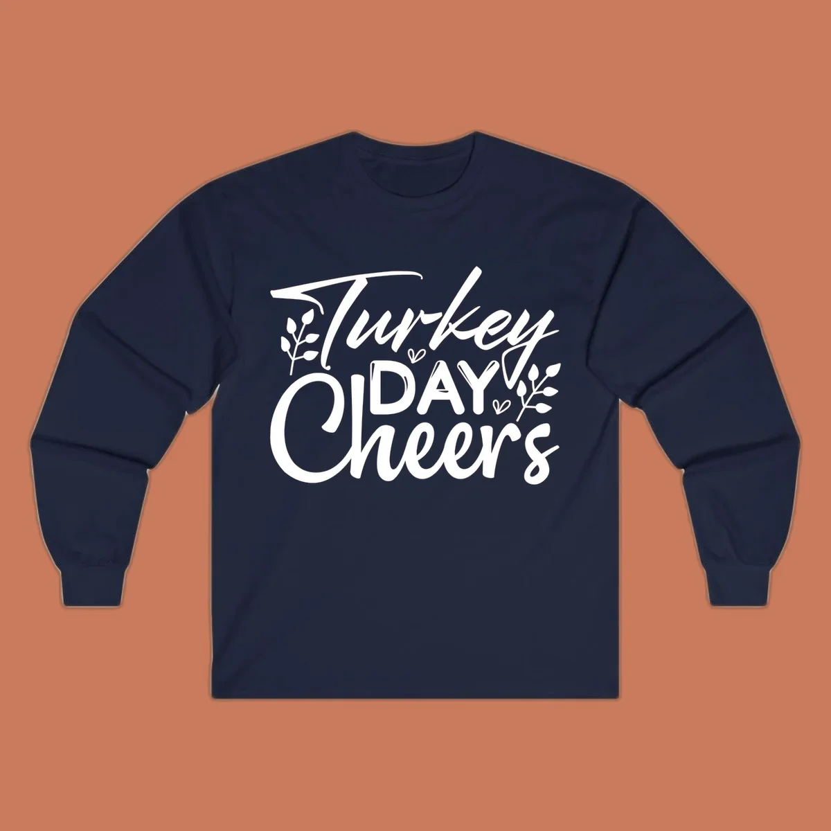 Typography design with "Turkey DAY Cheers" and decorative leaves, a Thanksgiving sentiment.