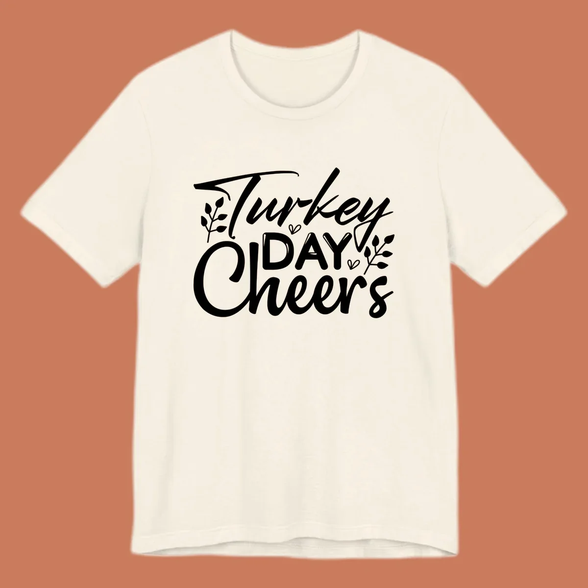 Typography design with "Turkey DAY Cheers" and decorative leaves, a Thanksgiving sentiment.