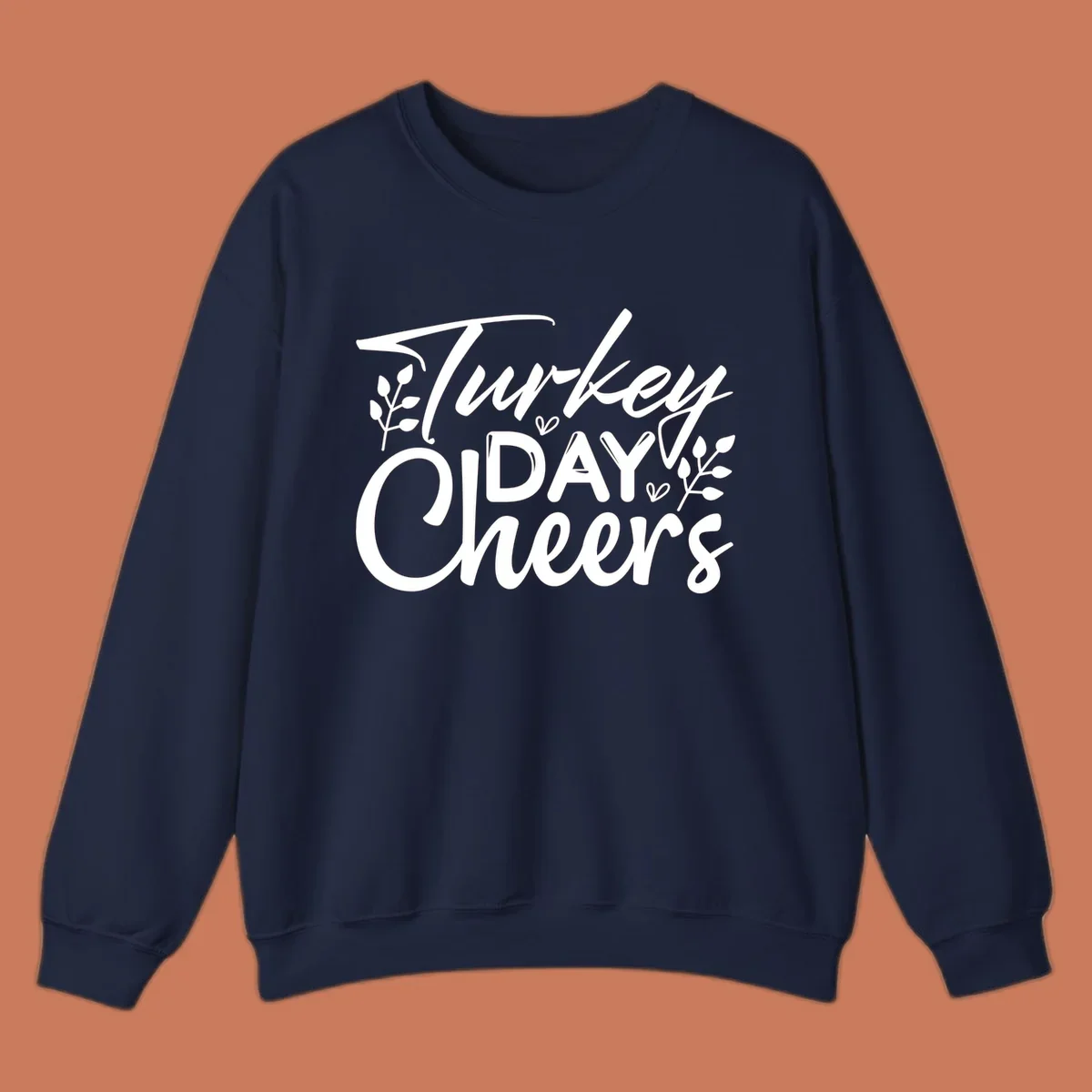 Typography design with "Turkey DAY Cheers" and decorative leaves, a Thanksgiving sentiment.