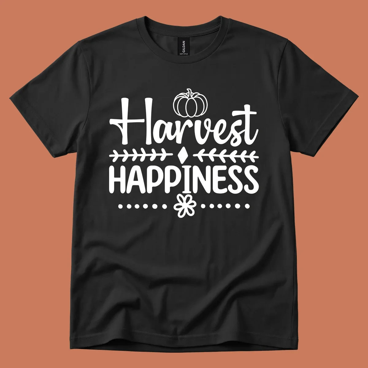 Harvest Happiness autumn sentiment design with pumpkin and floral accents.