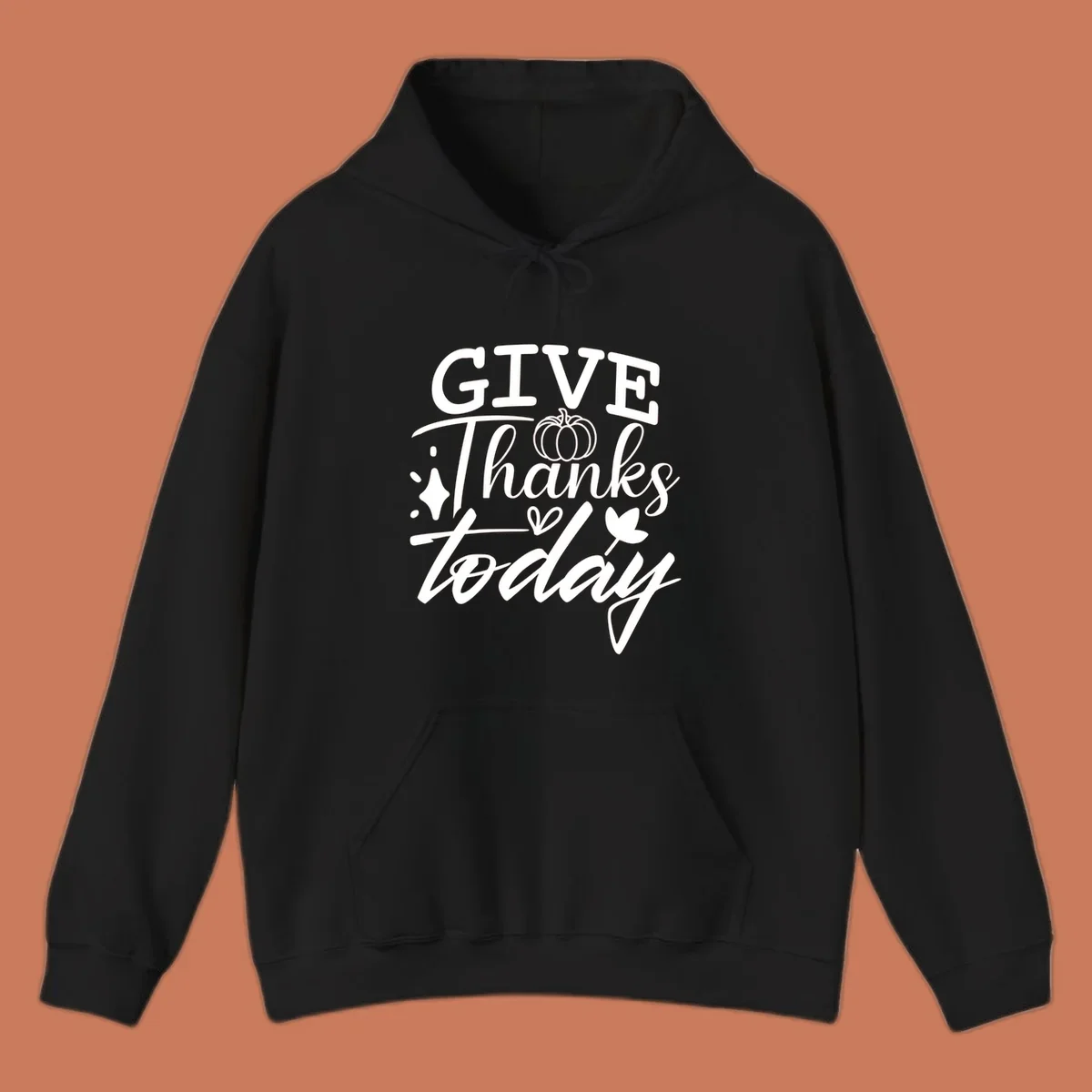 Give Thanks Today typography design with pumpkin and leaf elements.