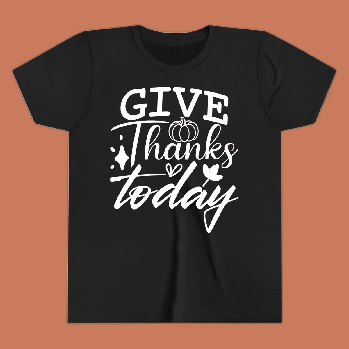 Give Thanks Today typography design with pumpkin and leaf elements.