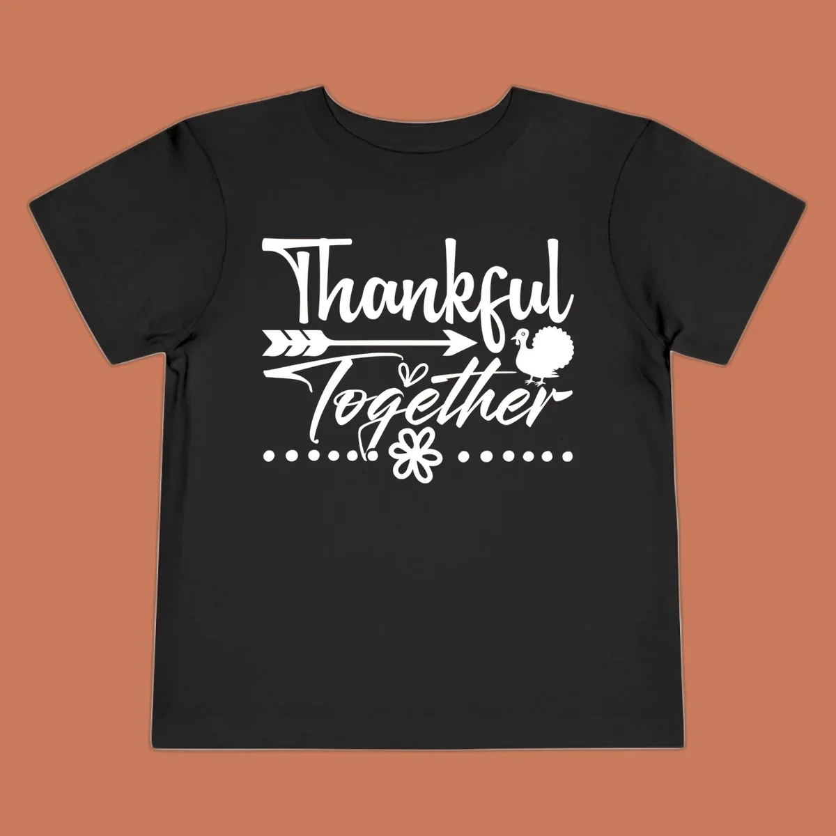Thankful Together harvest sentiment script text with arrow and turkey illustration.