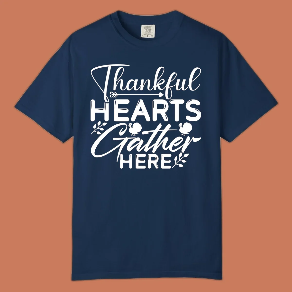 Thankful Hearts Gather Here text with turkeys and leaves for Thanksgiving. 