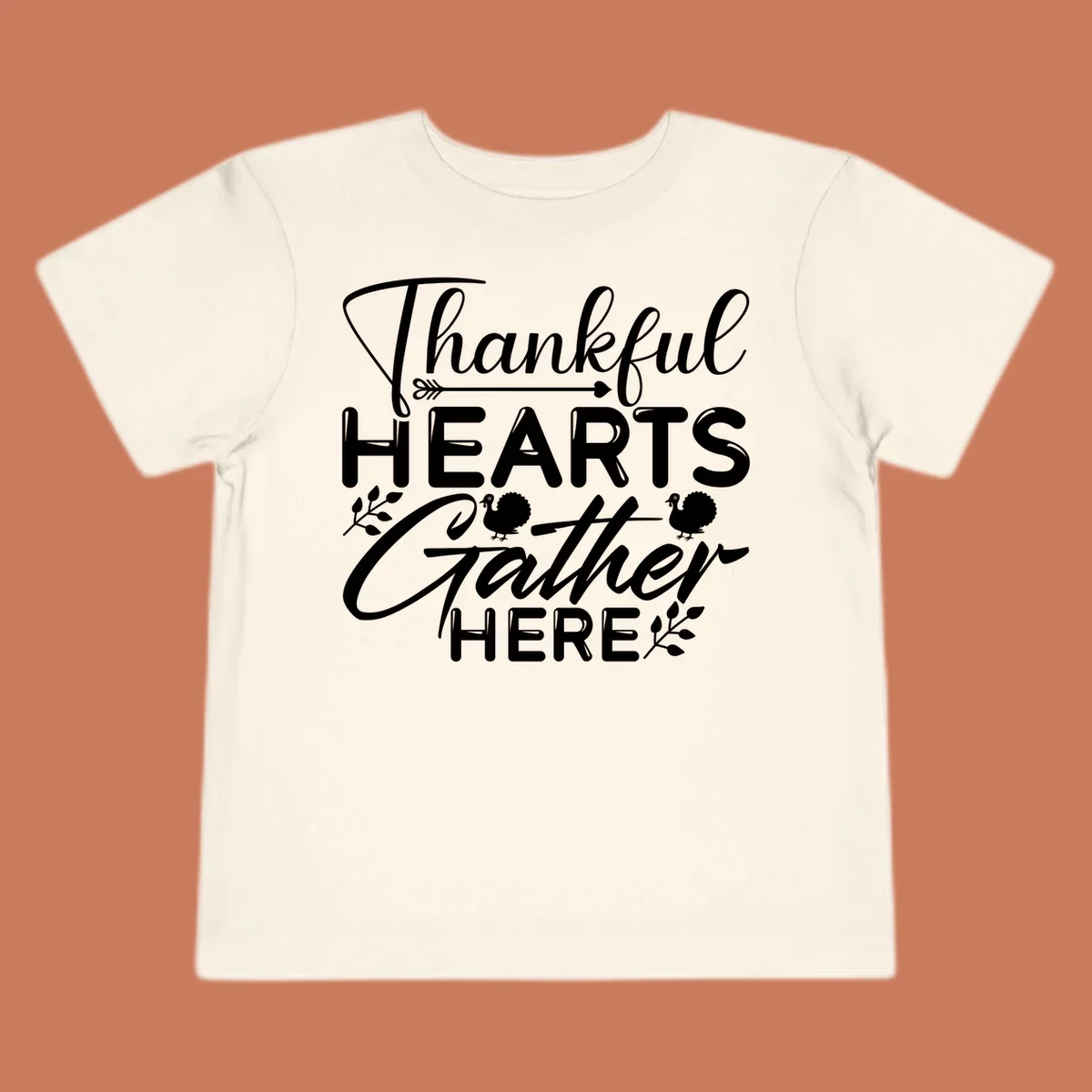 Thankful Hearts Gather Here text with turkeys and leaves for Thanksgiving. 