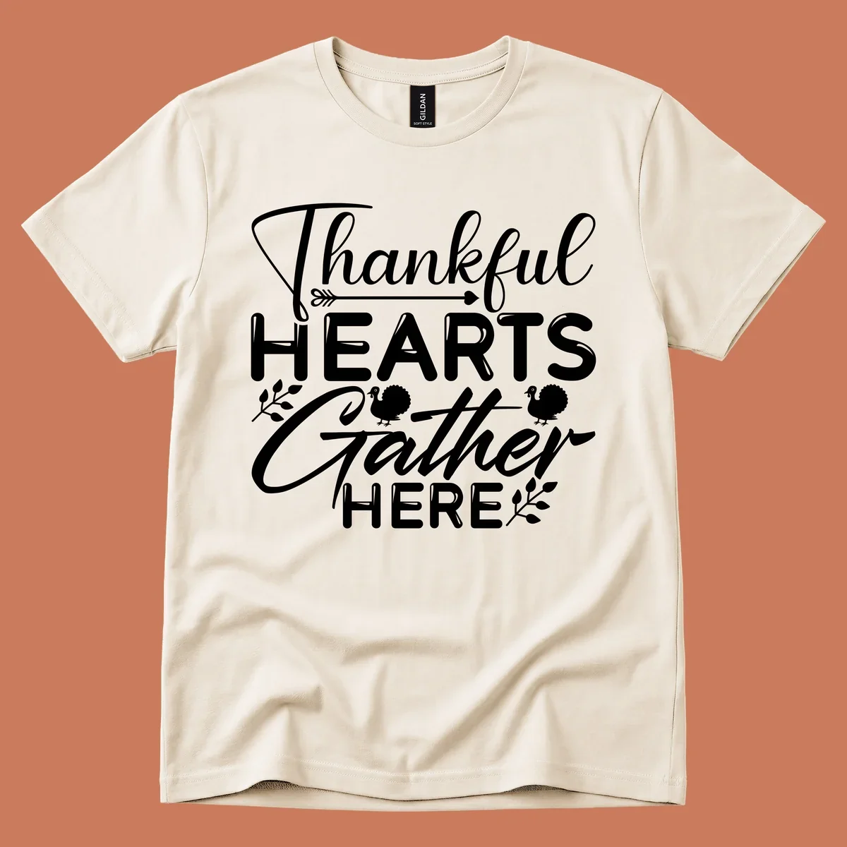 Thankful Hearts Gather Here text with turkeys and leaves for Thanksgiving. 