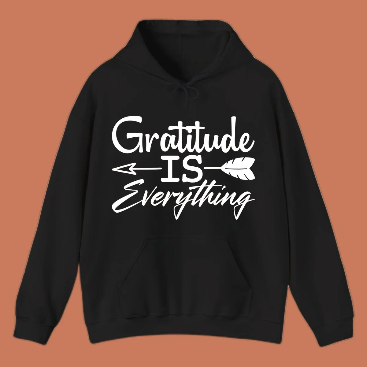 Gratitude Is Everything typography design with an arrow and feather graphic.