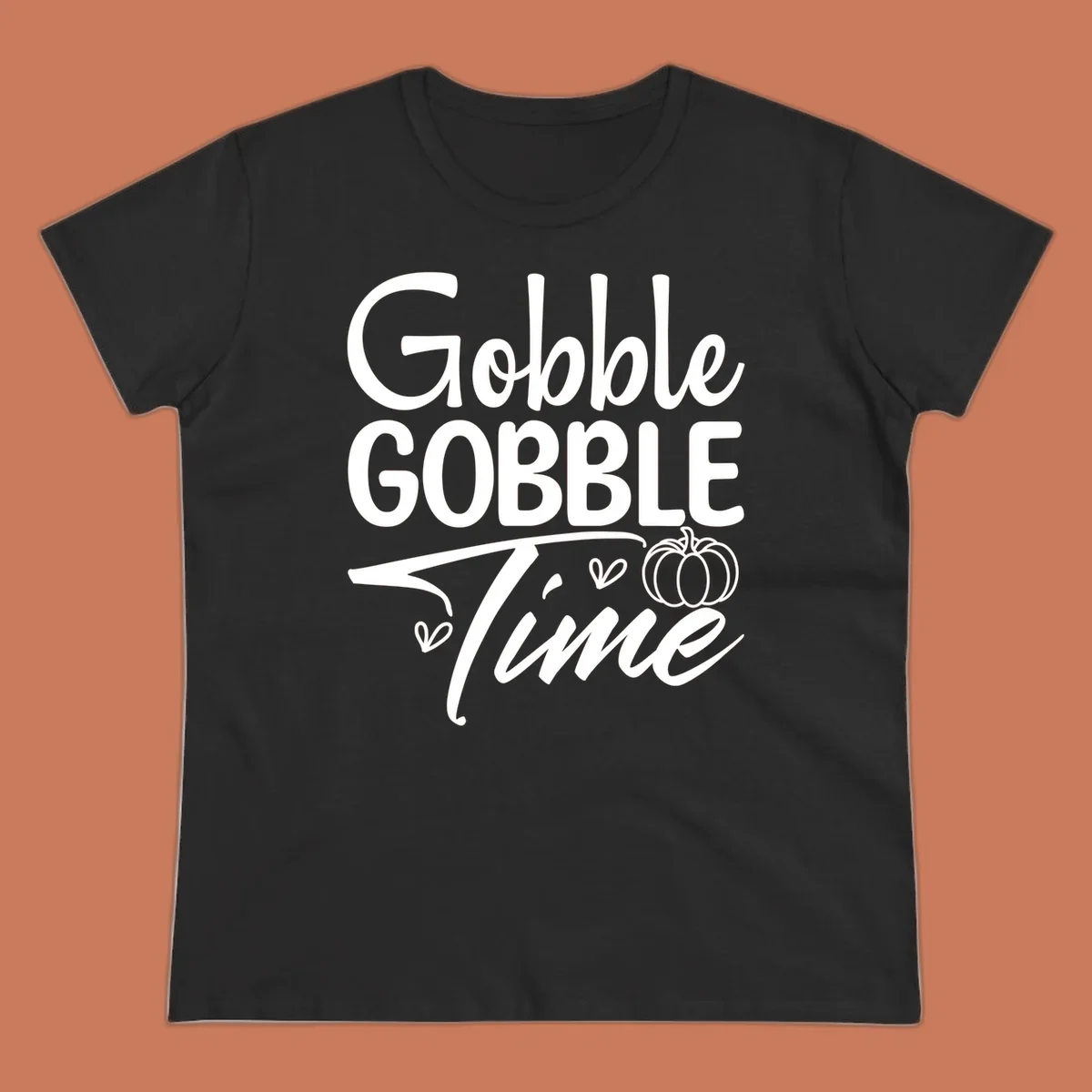 Gobble Gobble Time phrase with pumpkin and hearts, white typography on black background.