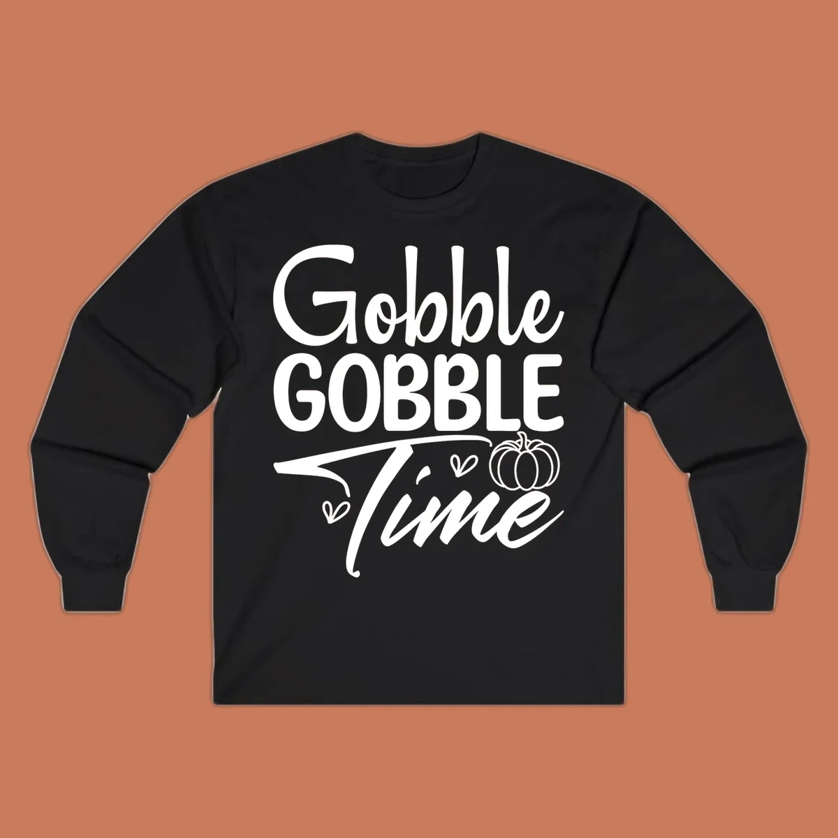 Gobble Gobble Time phrase with pumpkin and hearts, white typography on black background.