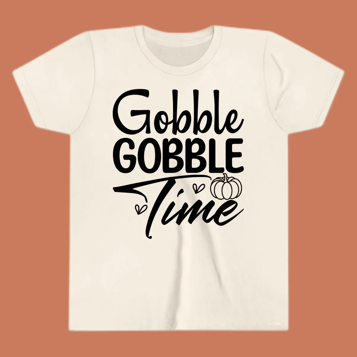 Gobble Gobble Time phrase with pumpkin and hearts, white typography on black background.