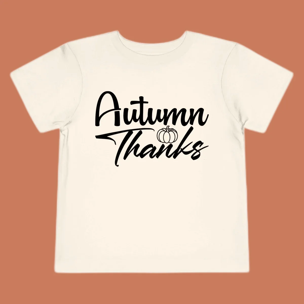 Autumn Thanks script text with a pumpkin illustration, autumn-thanks-pumpkin design.
