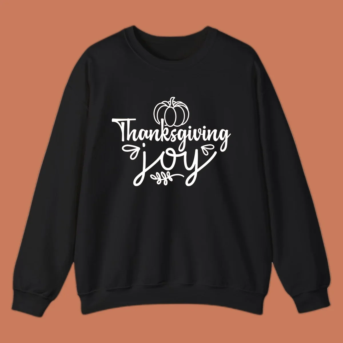 Thanksgiving Joy script text with a pumpkin illustration, for gratitude tees.