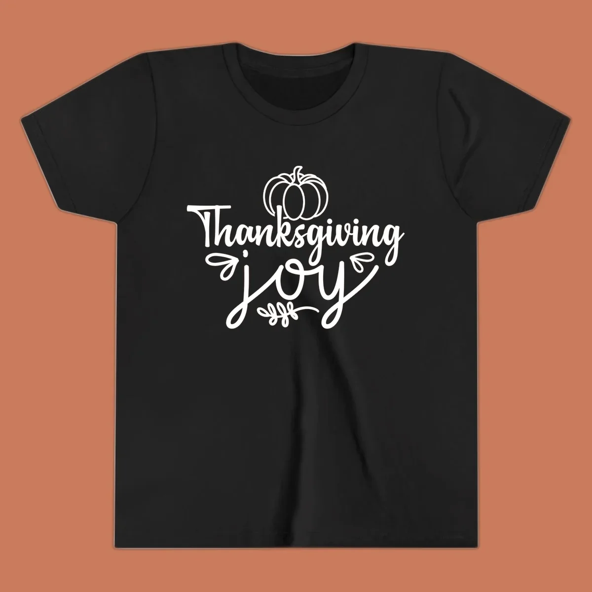 Thanksgiving Joy script text with a pumpkin illustration, for gratitude tees.