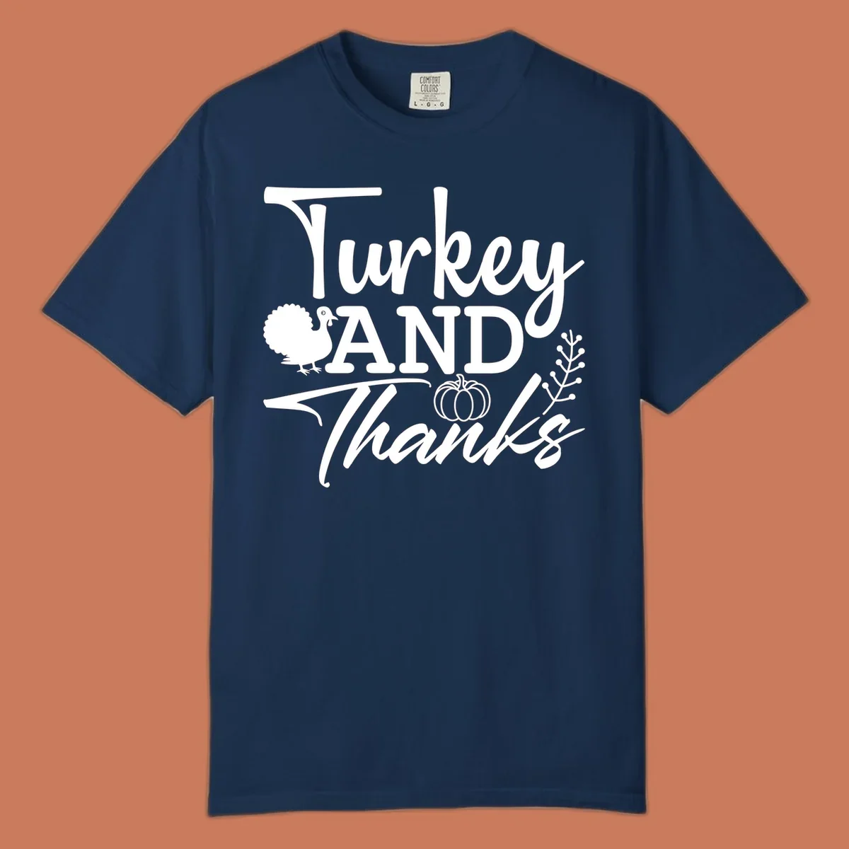 Thanksgiving turkey and thanks sentiment graphic with turkey, pumpkin, and leafy branch illustrations.