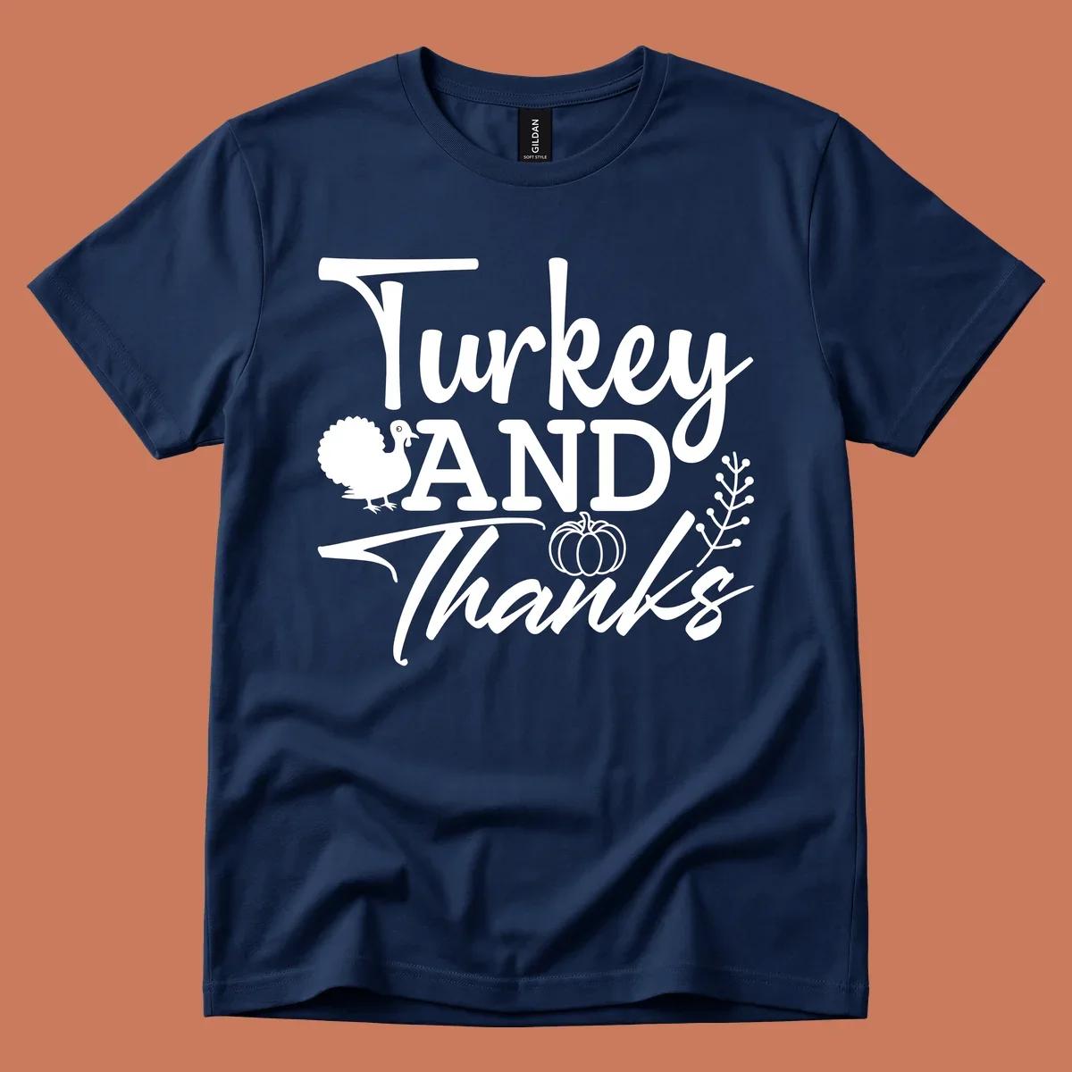 Thanksgiving turkey and thanks sentiment graphic with turkey, pumpkin, and leafy branch illustrations.