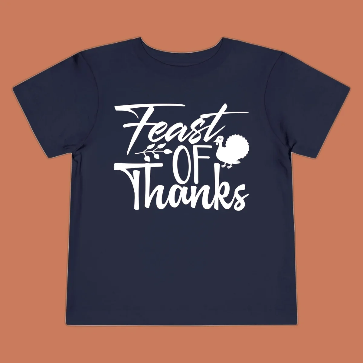 Feast Of Thanks typography design with a turkey illustration.
