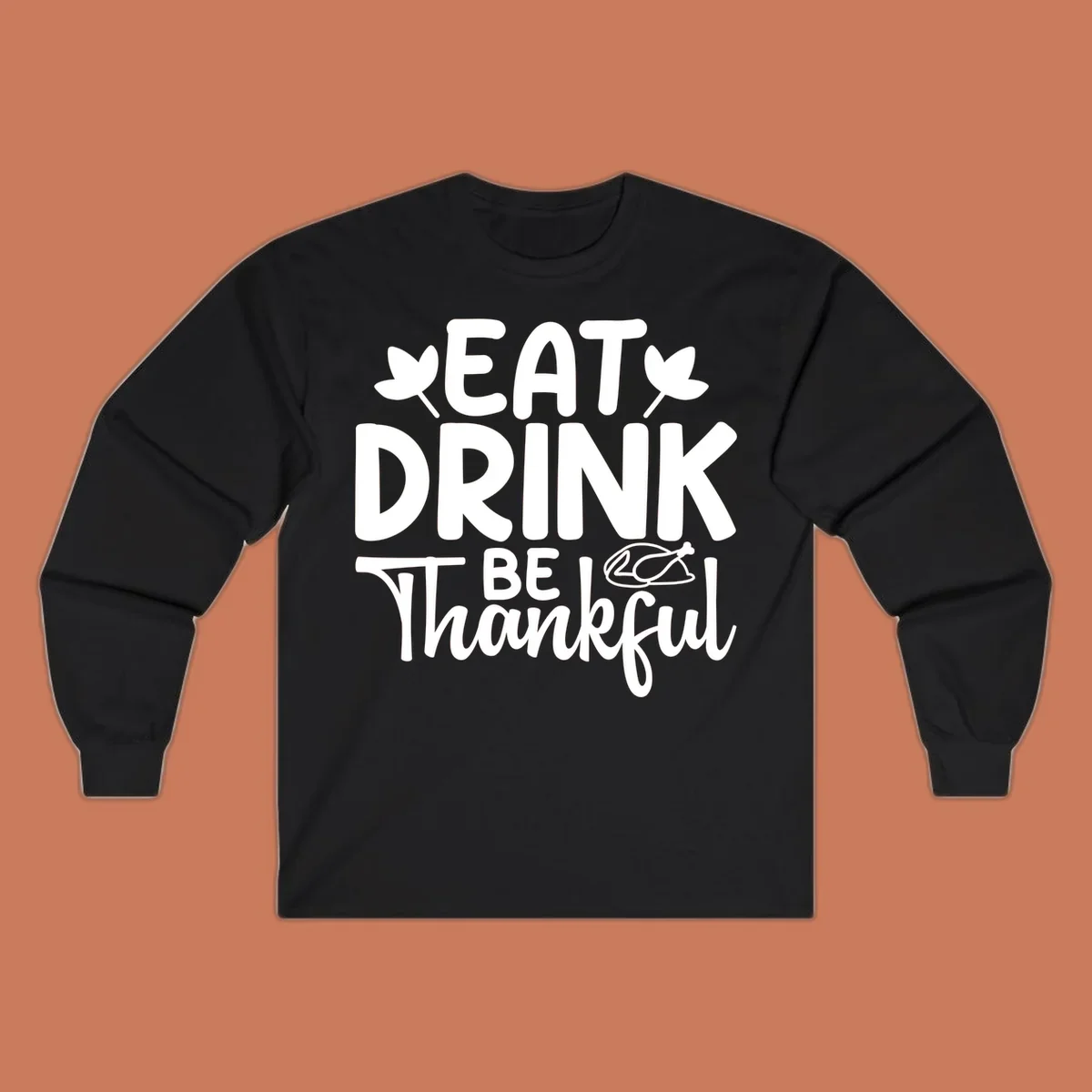 Eat Drink Be Thankful text with autumn leaves and a roasted chicken graphic.