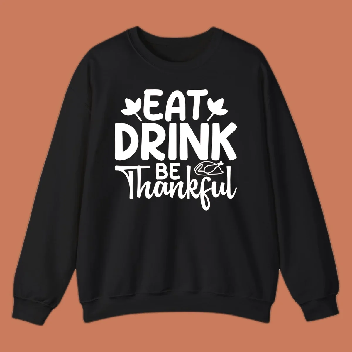 Eat Drink Be Thankful text with autumn leaves and a roasted chicken graphic.