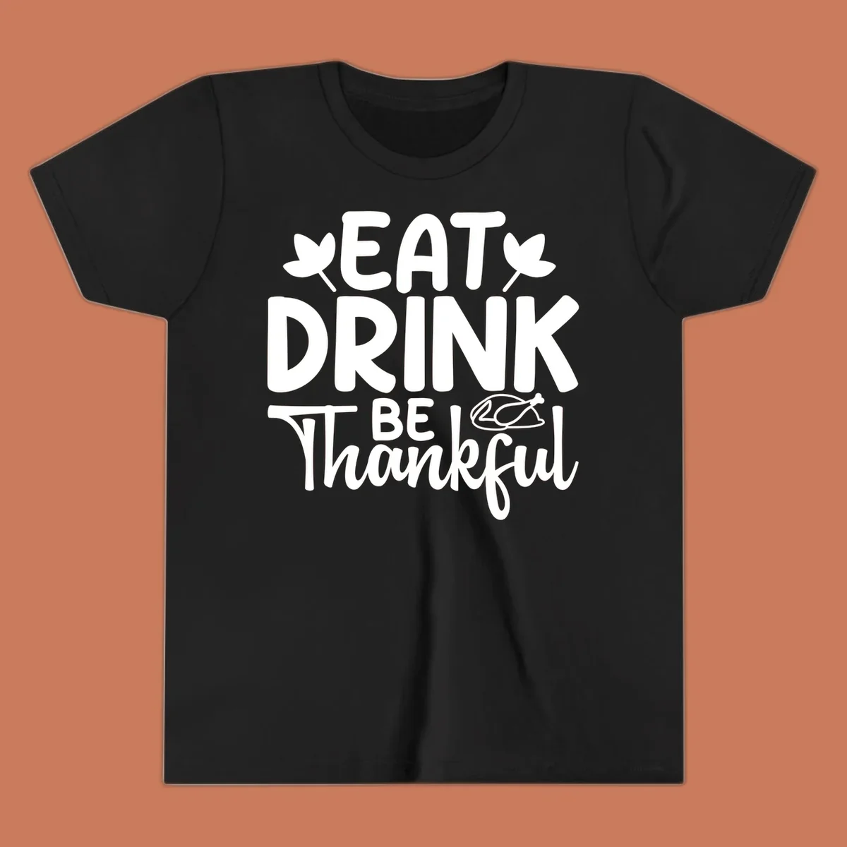 Eat Drink Be Thankful text with autumn leaves and a roasted chicken graphic.