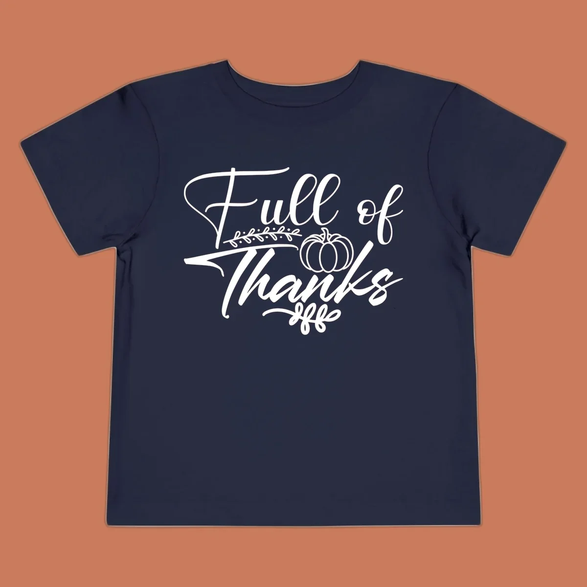 Elegant white script typography 'Full of Thanks' with pumpkin and leaf vine graphic for gratitude themes.