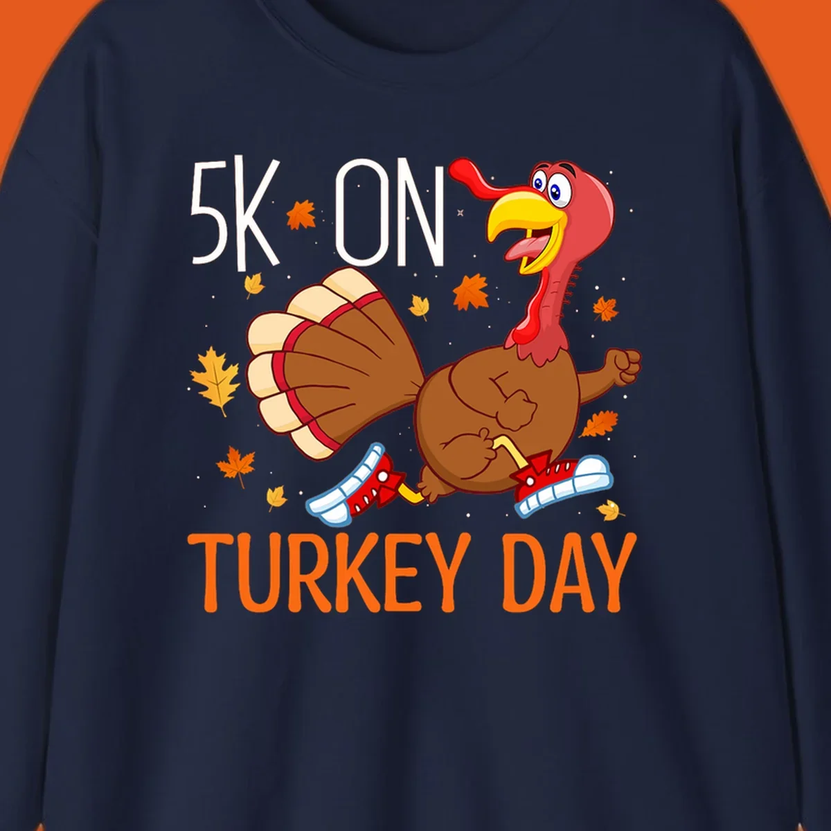 Running turkey illustration with "5K ON TURKEY DAY" text for Turkey Trot shirts.