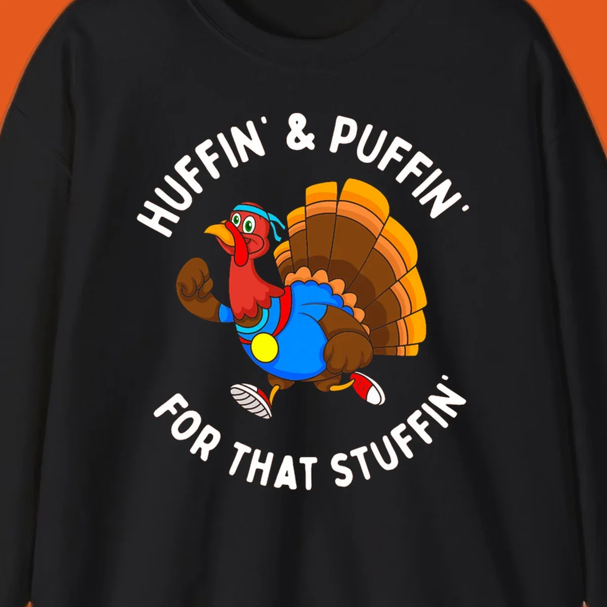 Running turkey cartoon with text 'Huffin' & Puffin' For That Stuffin'' for Turkey Trot runner.
