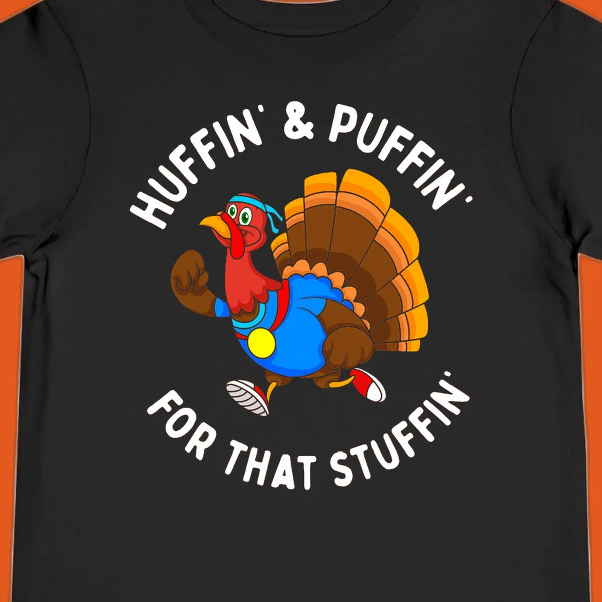 Running turkey cartoon with text 'Huffin' & Puffin' For That Stuffin'' for Turkey Trot runner.