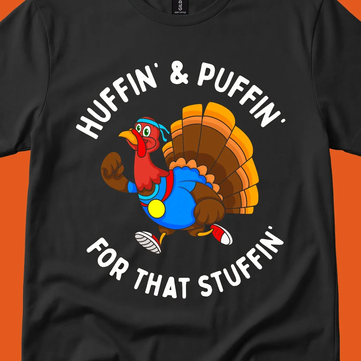Running turkey cartoon with text 'Huffin' & Puffin' For That Stuffin'' for Turkey Trot runner.