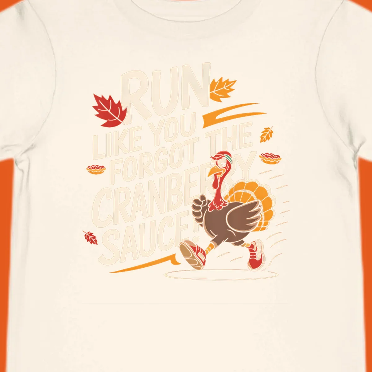 Running turkey illustration with text 'Run Like You Forgot The Cranberry Sauce' for Turkey Trot shirts.