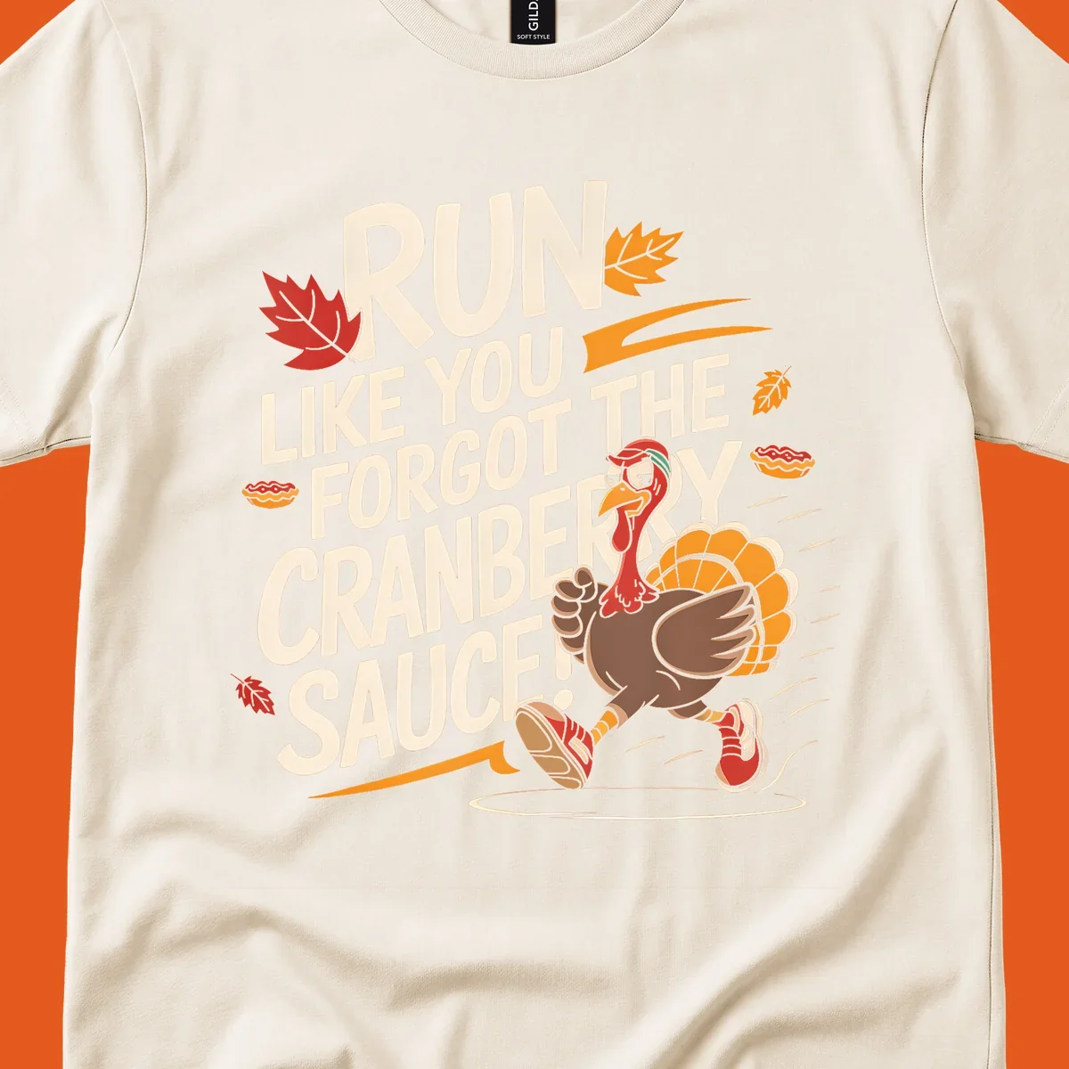 Running turkey illustration with text 'Run Like You Forgot The Cranberry Sauce' for Turkey Trot shirts.
