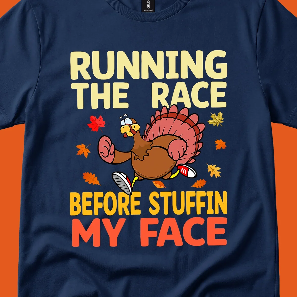 Running turkey with text "RUNNING THE RACE BEFORE STUFFIN MY FACE", a Thanksgiving run concept.