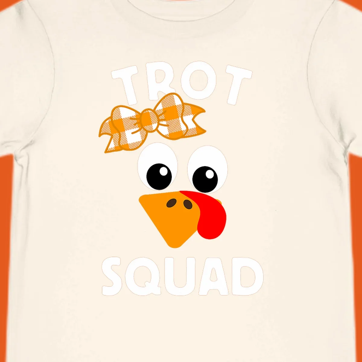Turkey Trot Squad text with a cartoon turkey face and bow, for Thanksgiving running.