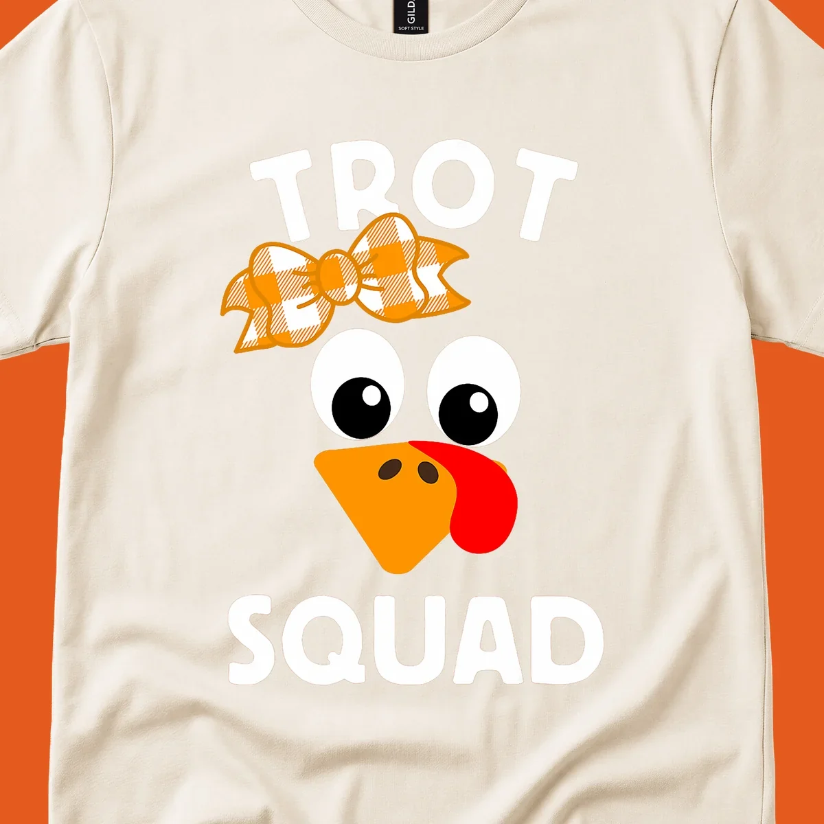 Turkey Trot Squad text with a cartoon turkey face and bow, for Thanksgiving running.