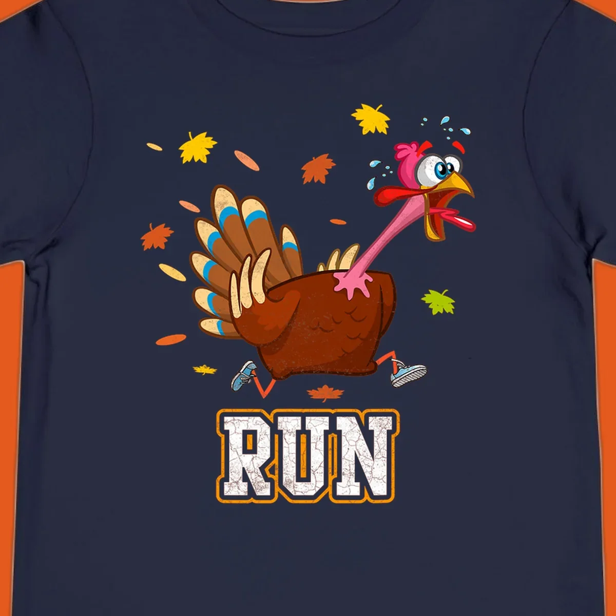 Cartoon running turkey with text RUN, for Thanksgiving Turkey Trot races.