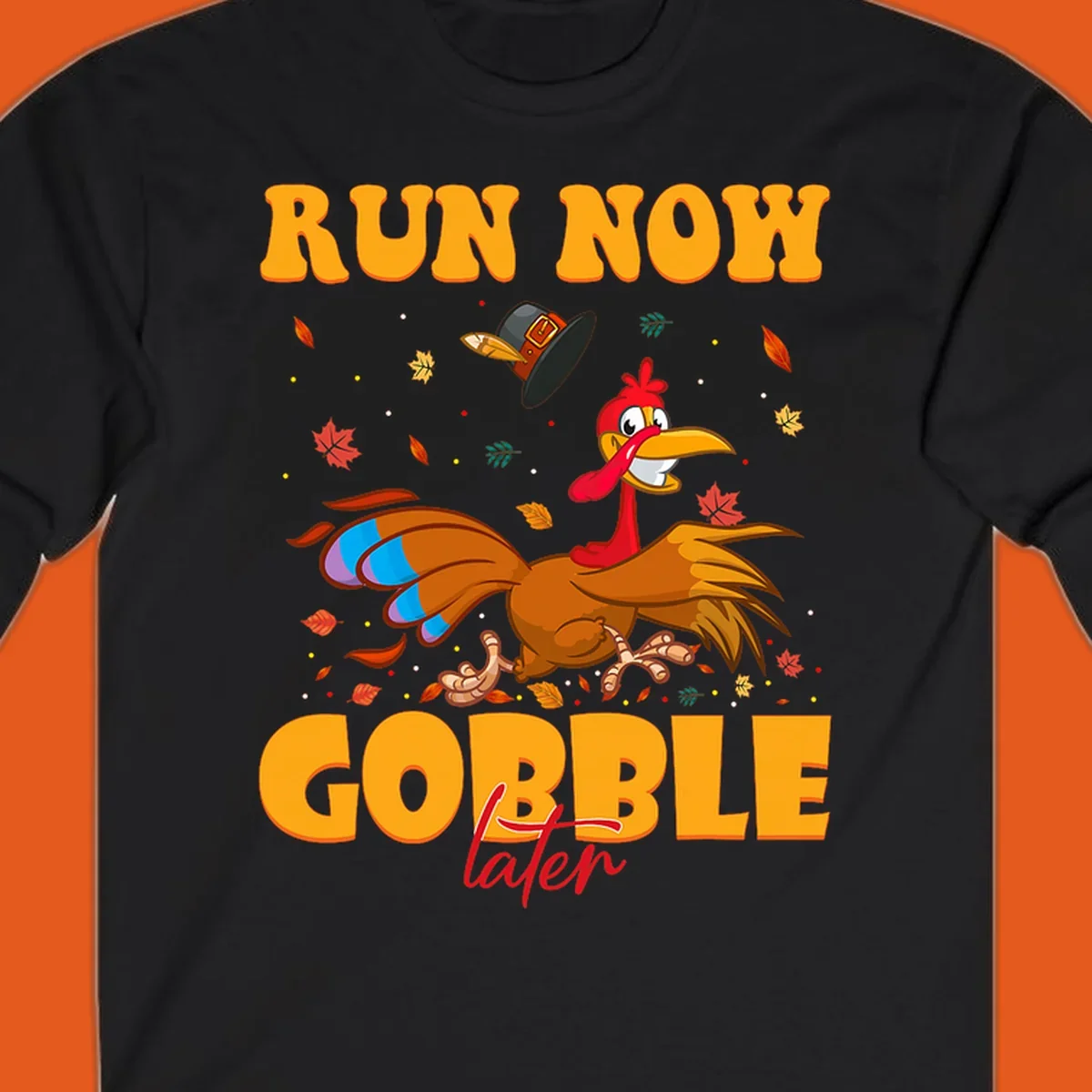Cartoon turkey running with pilgrim hat, text "RUN NOW GOBBLE later" for Turkey Trot shirt.