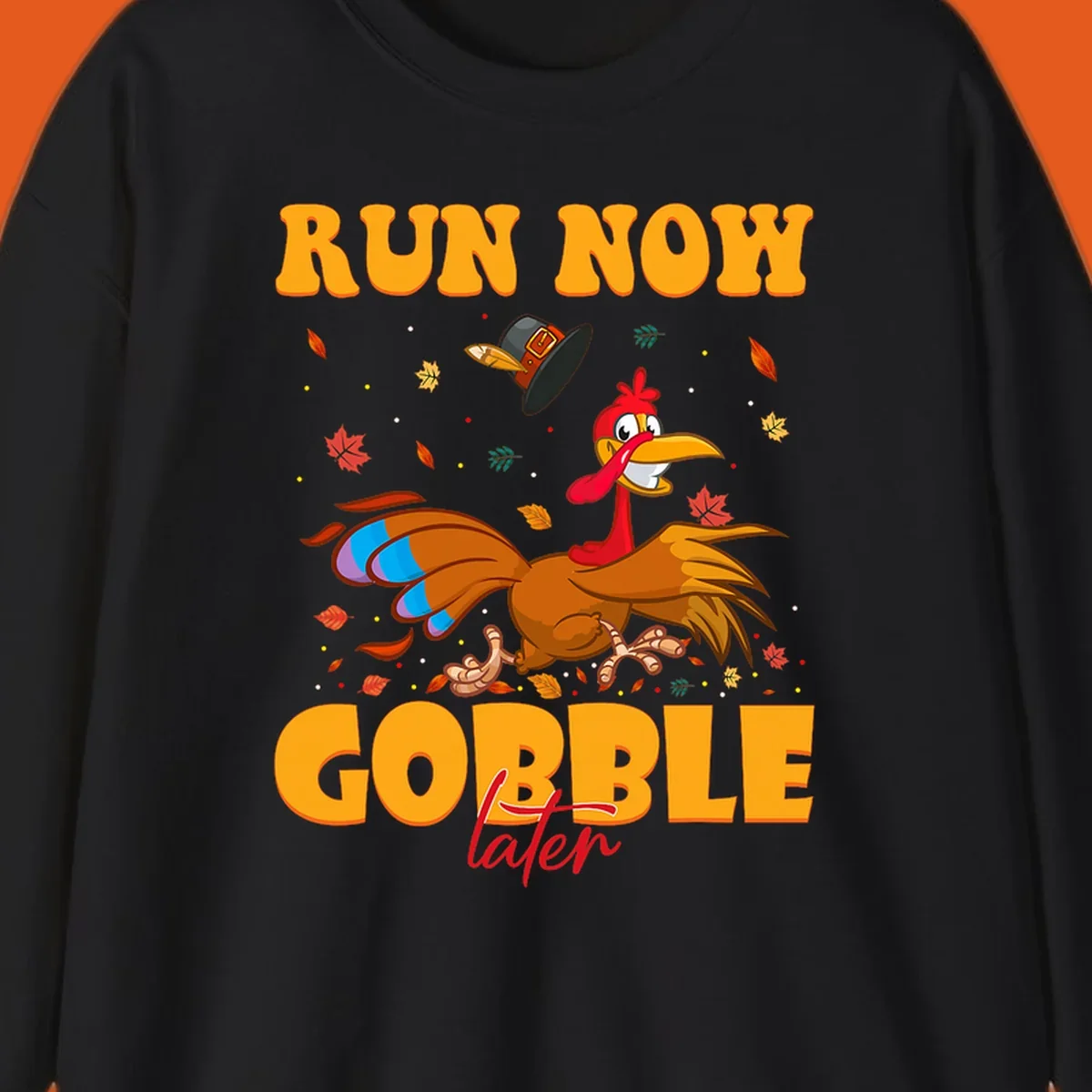 Cartoon turkey running with pilgrim hat, text "RUN NOW GOBBLE later" for Turkey Trot shirt.