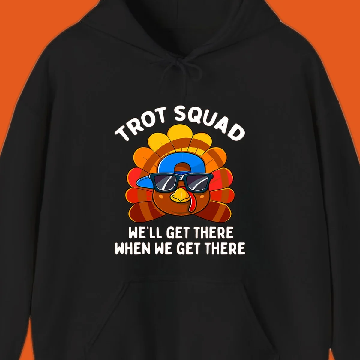Turkey Trot Squad cool turkey with sunglasses and cap, text 'WE'LL GET THERE WHEN WE GET THERE' shirt