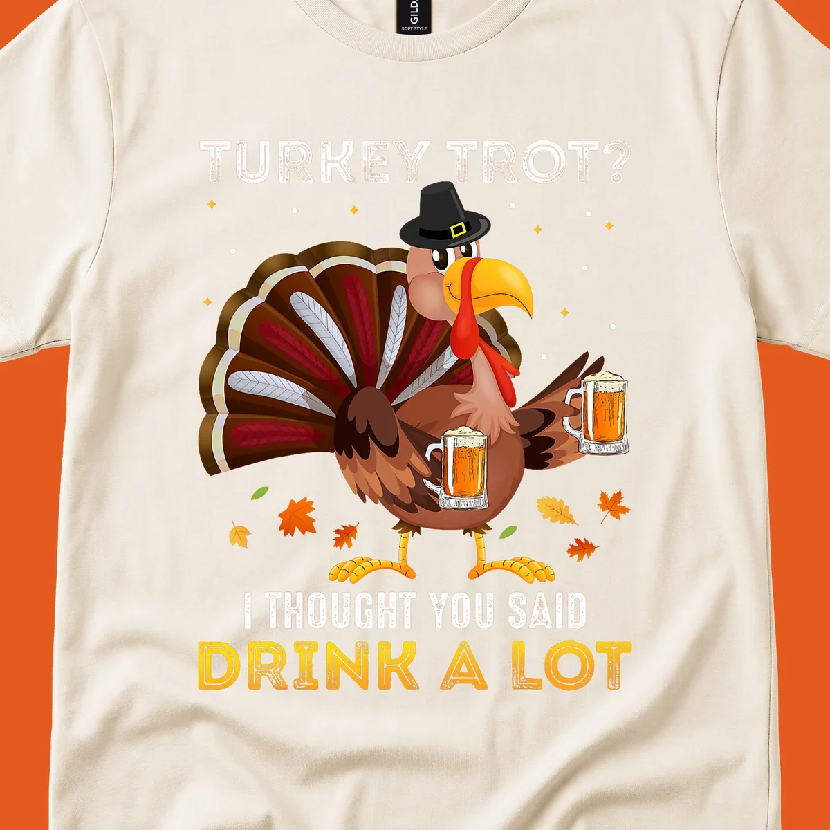 Cartoon turkey holding beer mugs with text 'Turkey Trot? I thought you said Drink A Lot', for Turkey Drink Trot shirts.