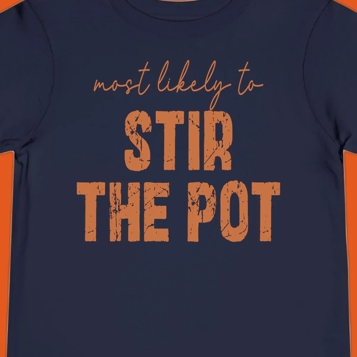 Text design: 'most likely to STIR THE POT' in distressed orange font on a black background.