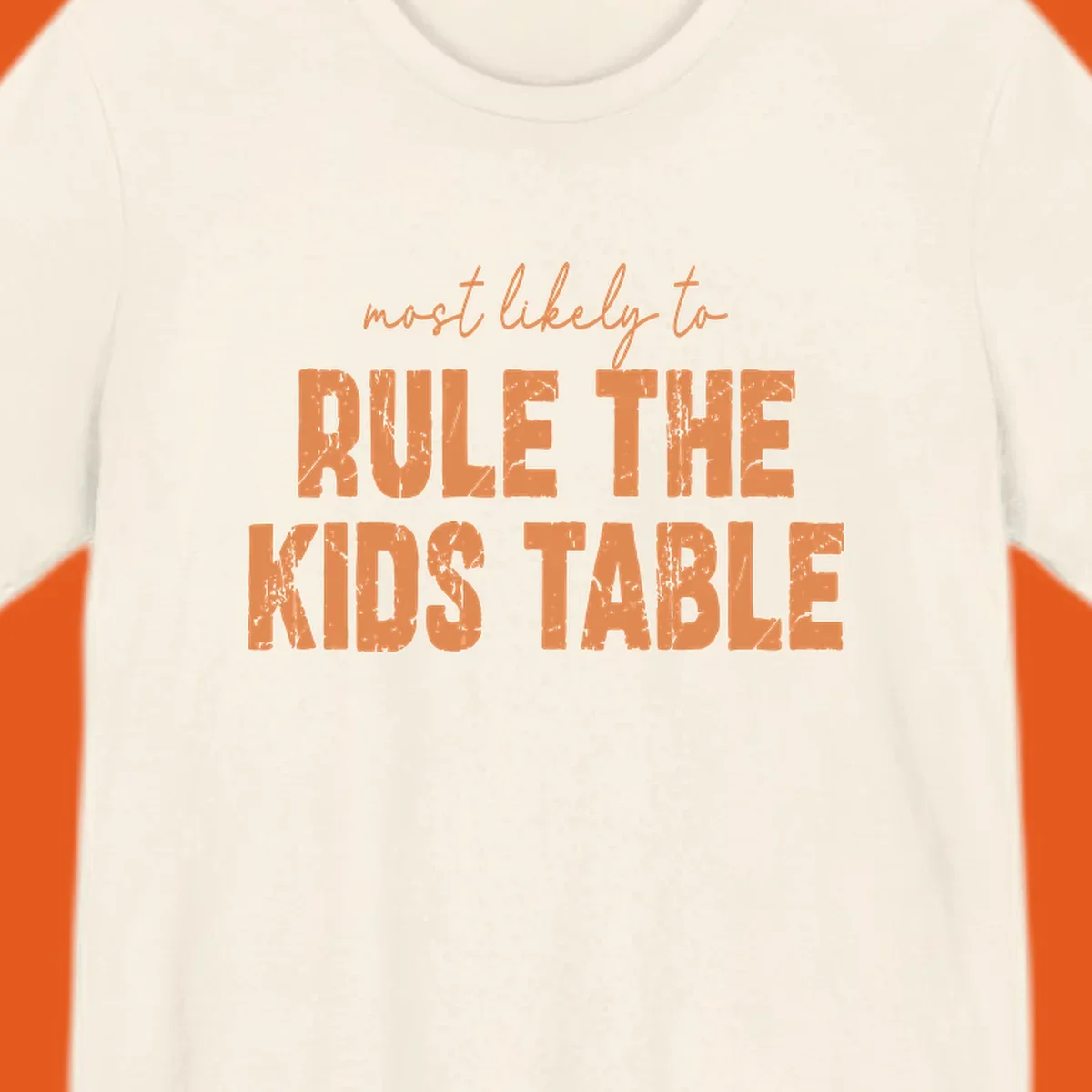 Text design 'most likely to rule the kids table' in distressed orange font.