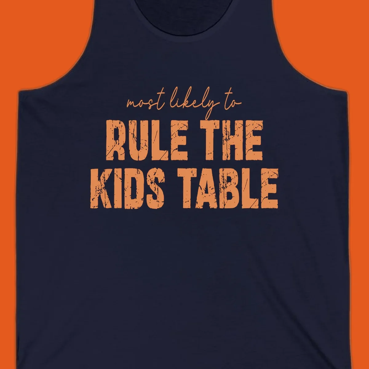 Text design 'most likely to rule the kids table' in distressed orange font.