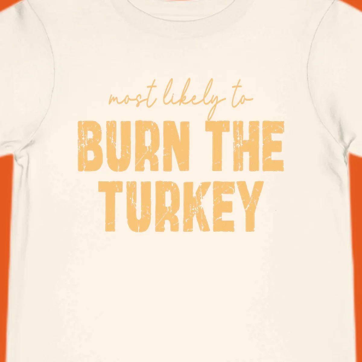 Text design "most likely to BURN THE TURKEY" with distressed lettering.